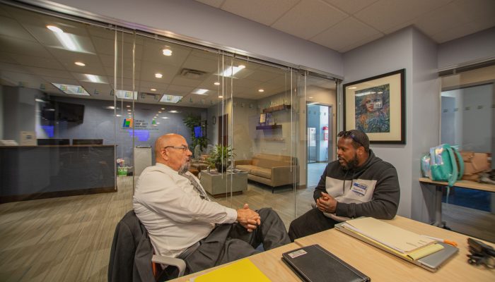 Facilitator guiding budgeting exercise